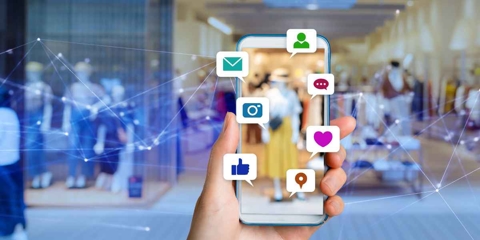 Social media icons over a phone