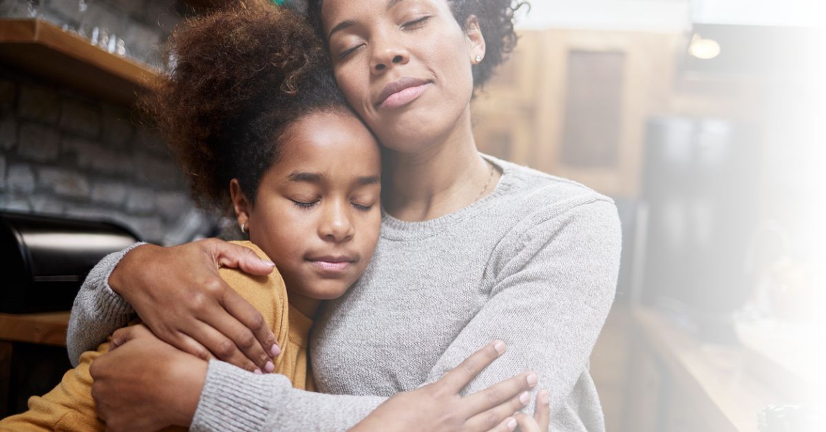 Mom comforting daughter