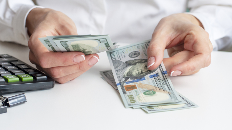 woman counting money