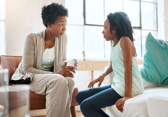 mother and daughter talking seriously